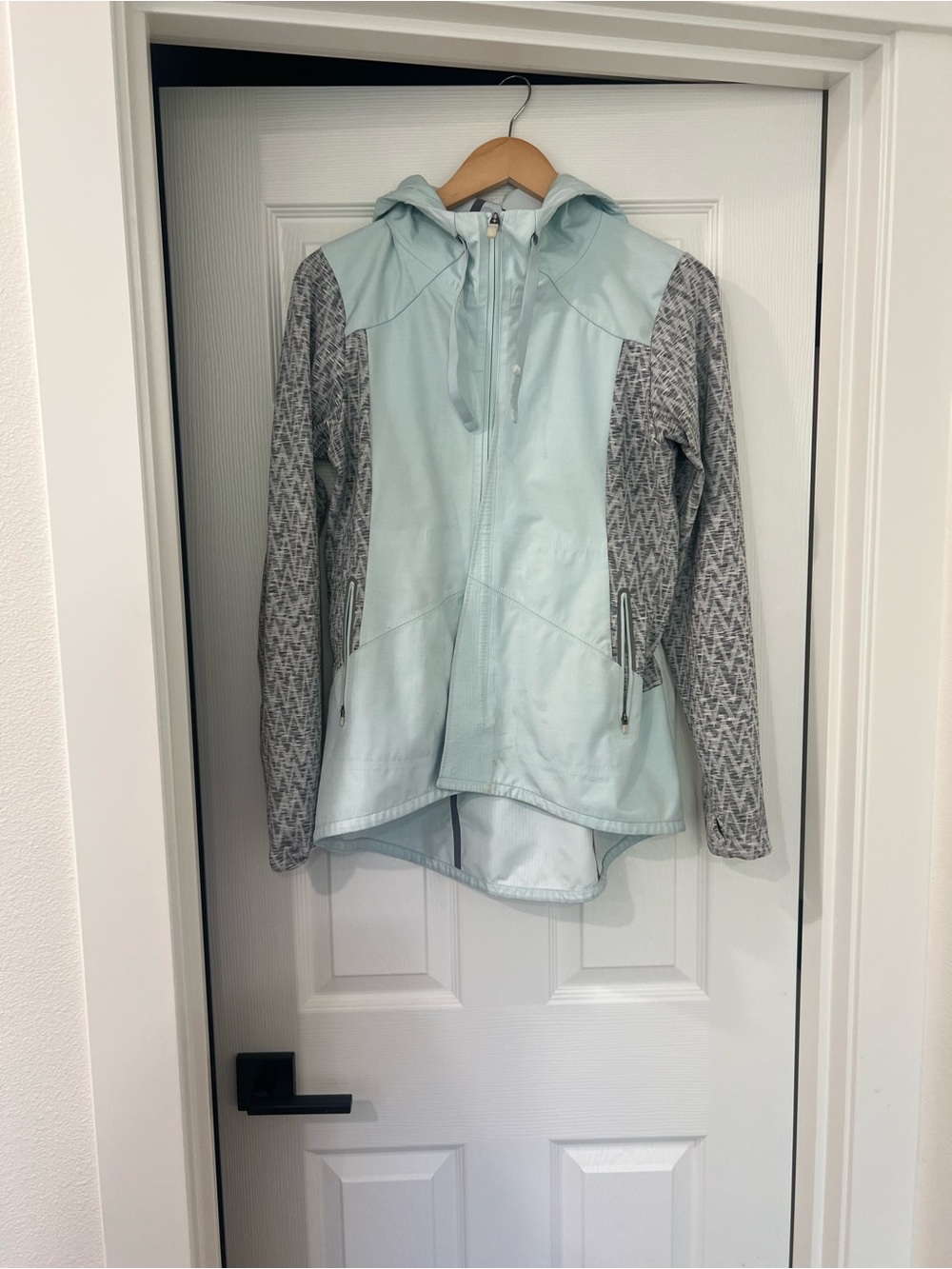 The North Face Light Blue Hooded Utility Jacket with Gray Patterned Sleeves